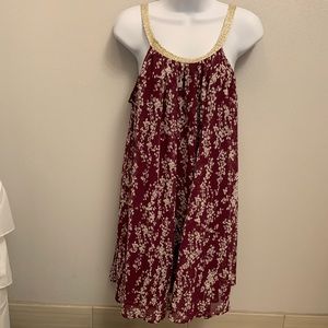 Charming Charlie floral dress with gold detail.